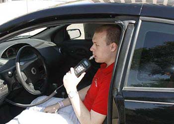A man blows into an interlock device, but is this the last word in DUI prevention?